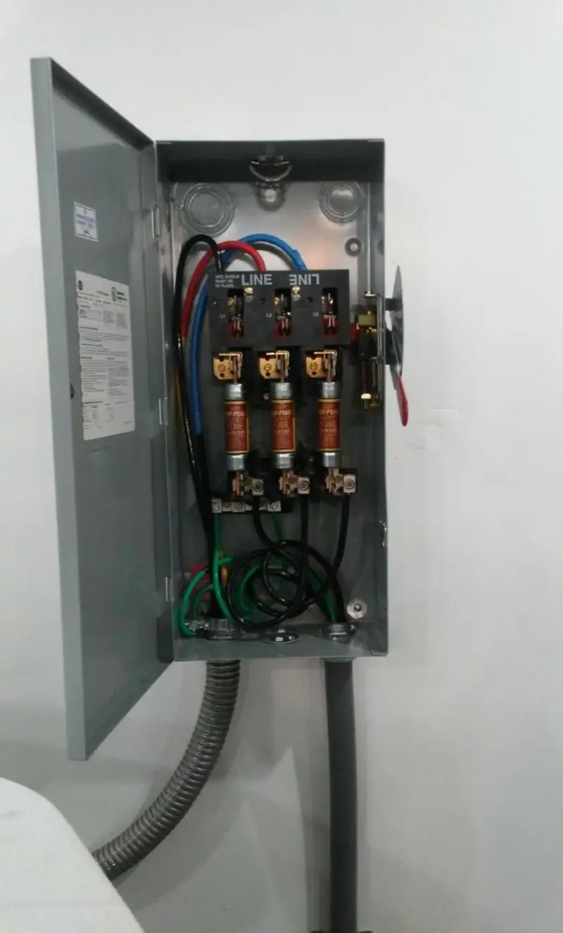 Three-phase disconnect switch installed for Smoke Detector Installation in Newcomerstown