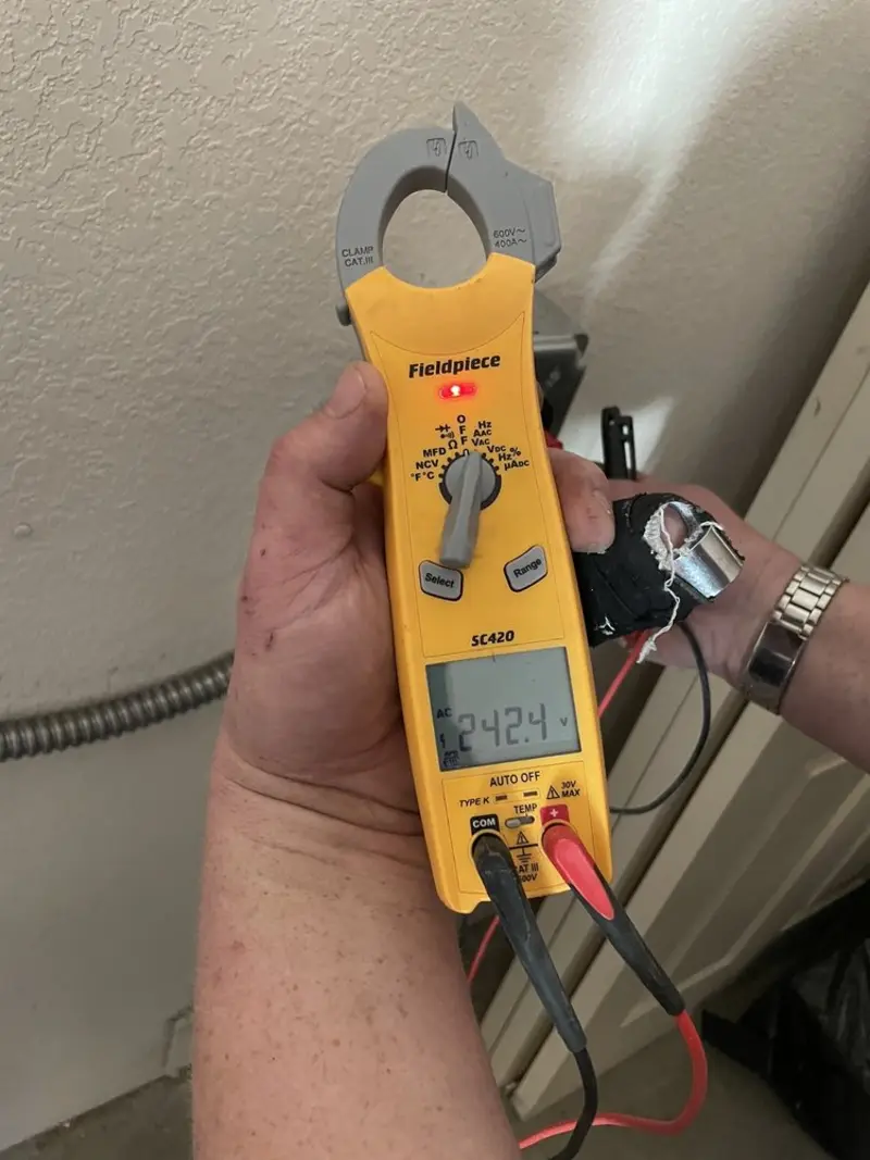 Voltage testing with clamp meter during Generator Installation in Newcomerstown